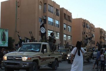 An image made available by Jihadist media outlet Welayat Raqqa on June 30, 2014, allegedly shows a member of the IS (Islamic state) militant group parading in a street in the northern rebel-held Syrian city of Raqqa. (Photo: AFP-Welayat Raqqa)
