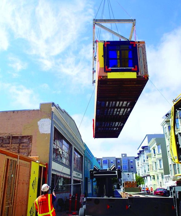 A modular house being moved into place. Photo: San Francisco Business Times